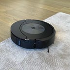 A Roomba Combo j7 Plus moving from hardwood floor to carpet