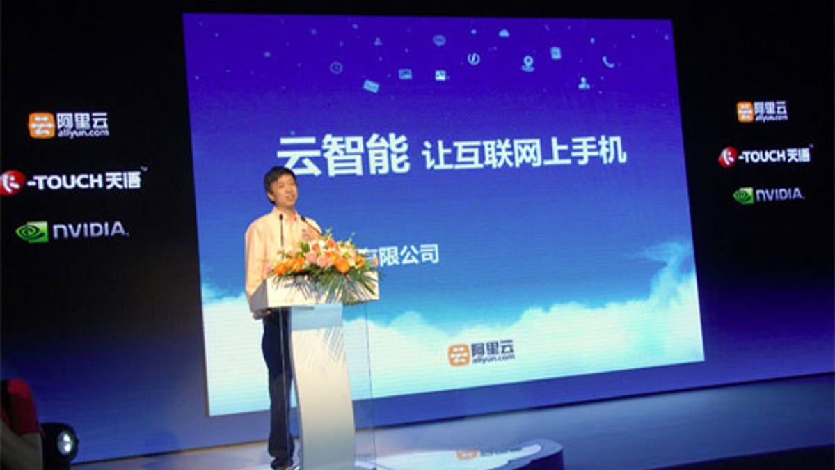 Alibaba Cloud Computing President Wang Jian unveiling Aliyun OS in July.