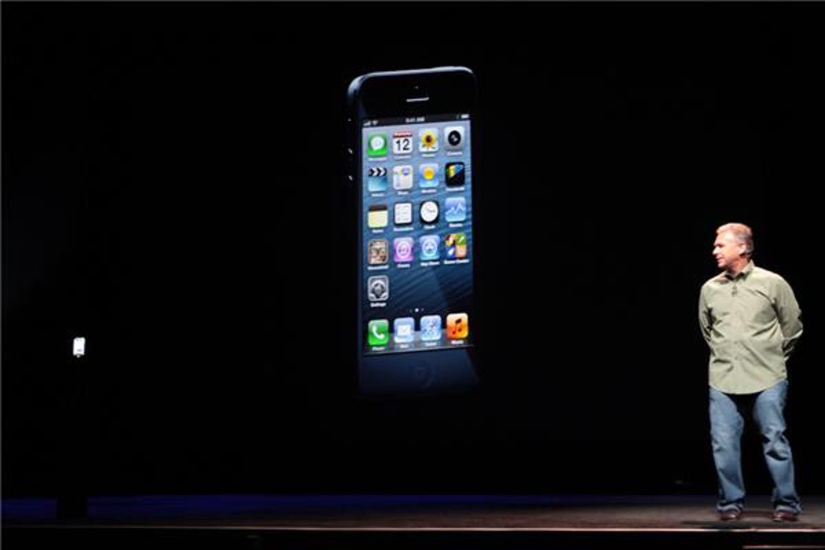 Apple's Phil Schiller showing off the new iPhone 5.