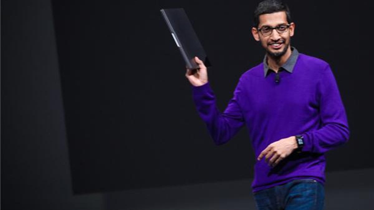Google senior vice president Sundar Pichai holds up the Chromebook Pixel, which was given out to I/O attendees for free.