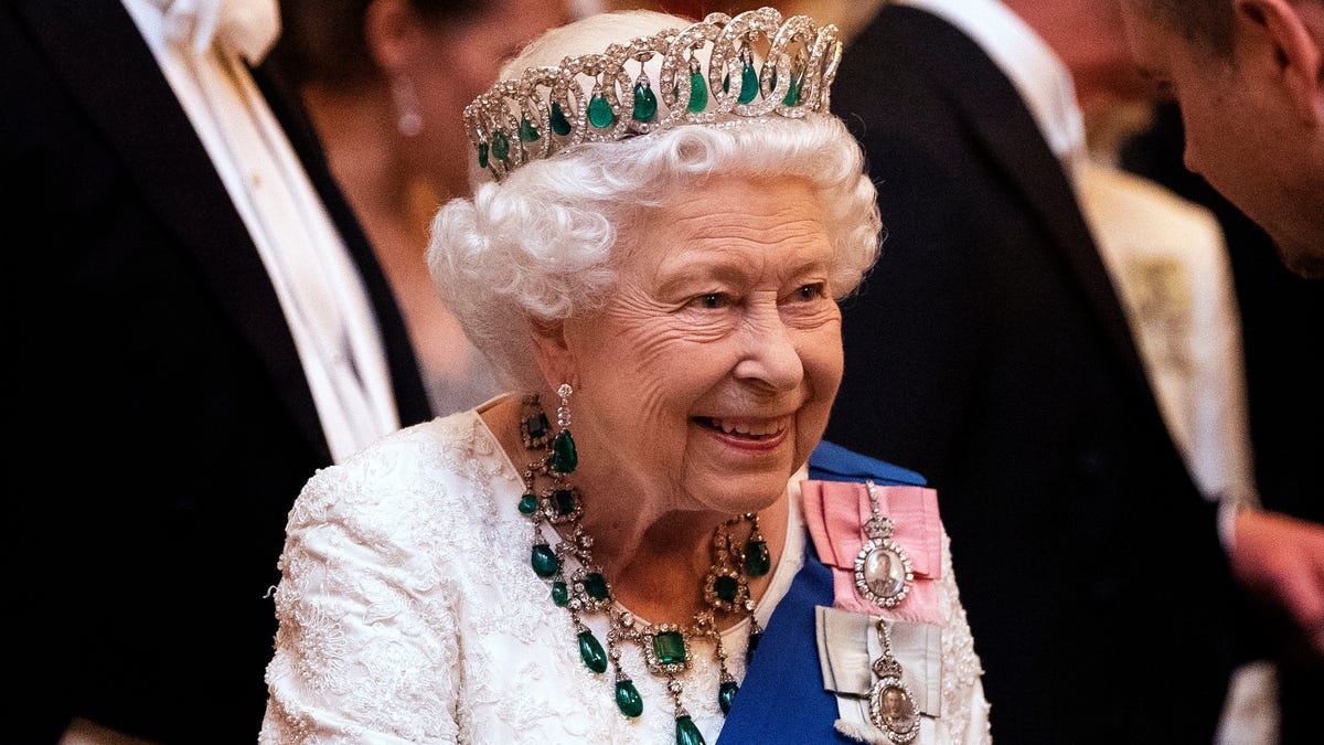 Queen Elizabeth II smiling in 2019
