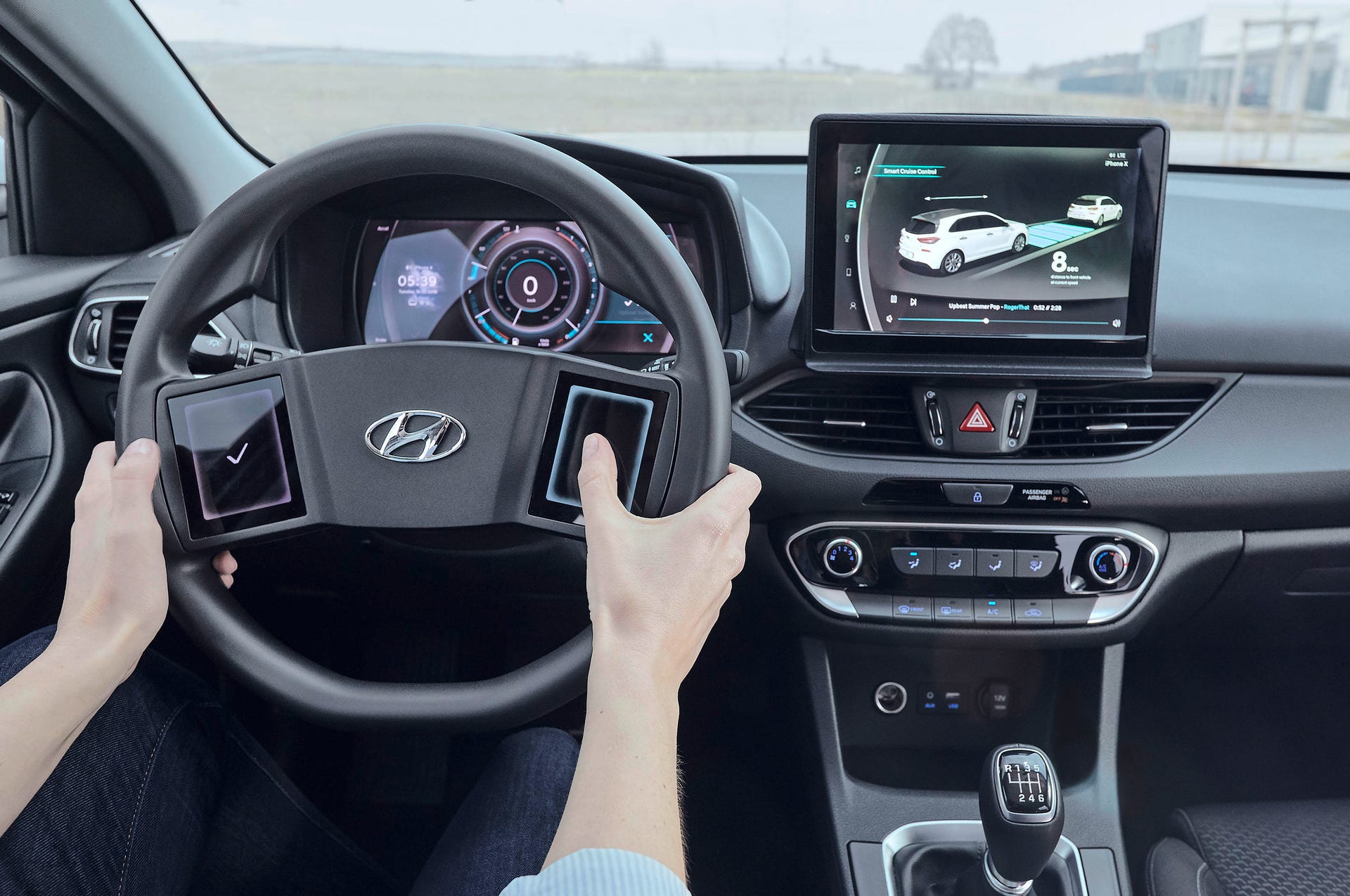 Hyundai's cockpit of the future involves massive steering wheel screens -  CNET