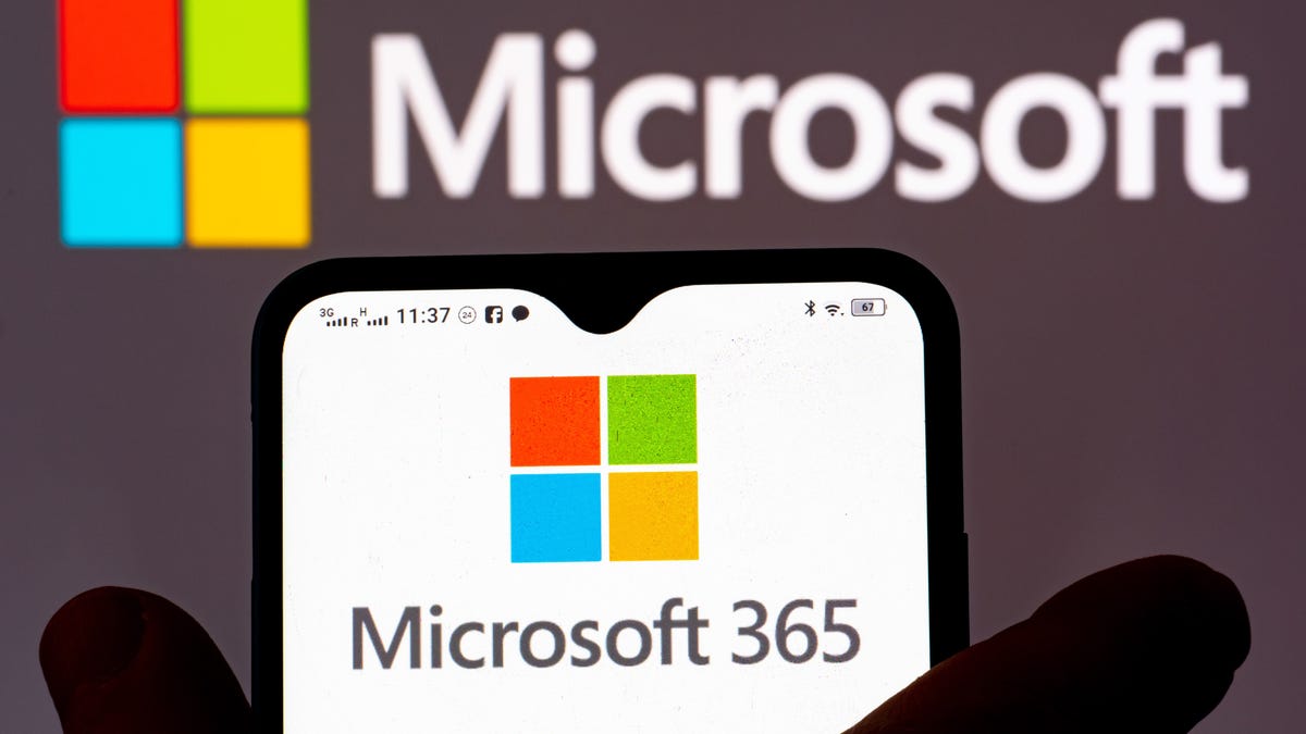 Photo illustration of hand holding a smart phone with the Microsoft Office 365 logo