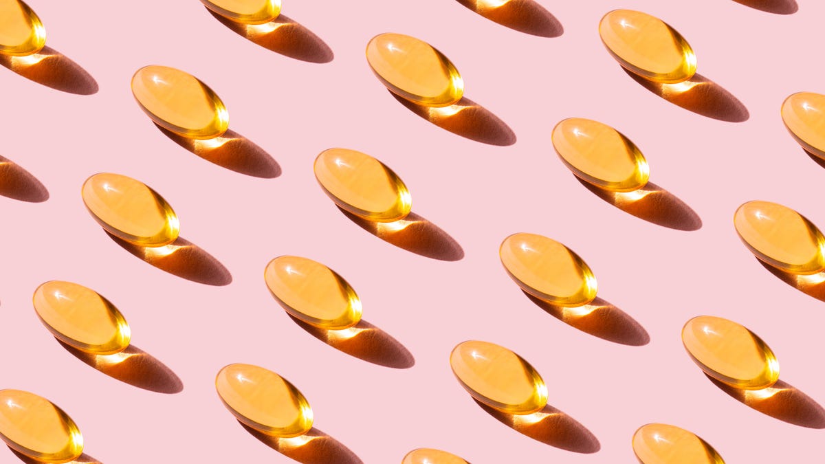 Omega 3 pills on a pink background