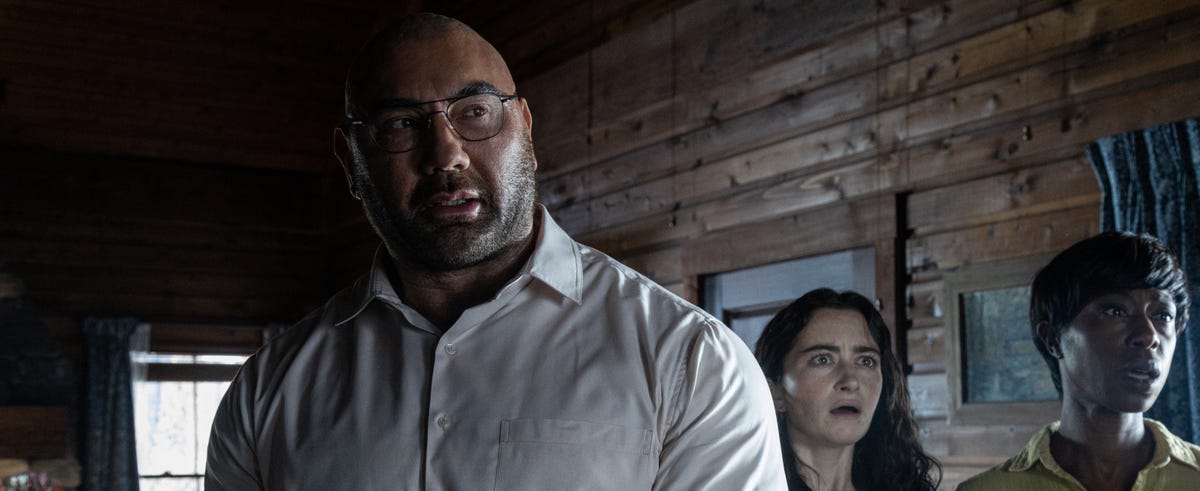 Dave Bautista looms in horror movie Knock at the Cabin.