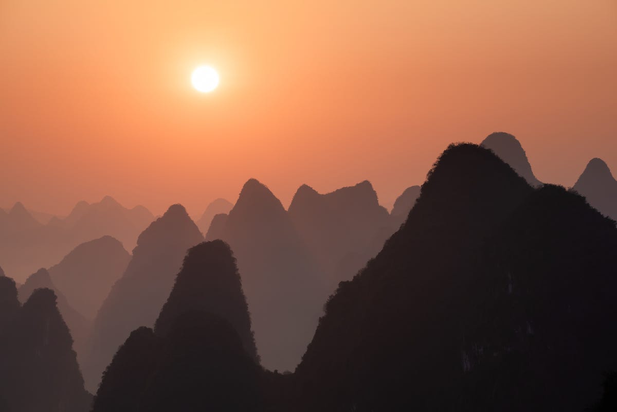 sunset, china, over mountains