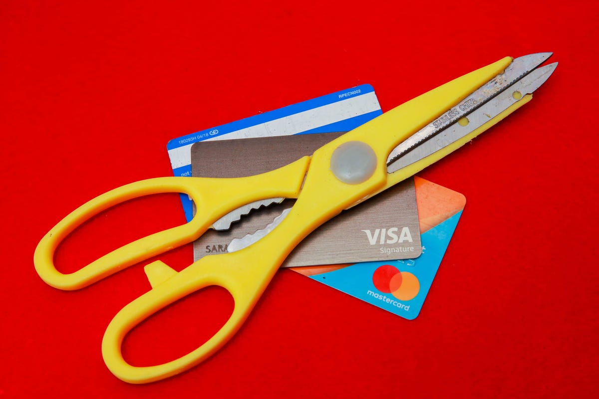 002-cutting-up-credit-cards-debt-cash-money-stimulus-debt-2