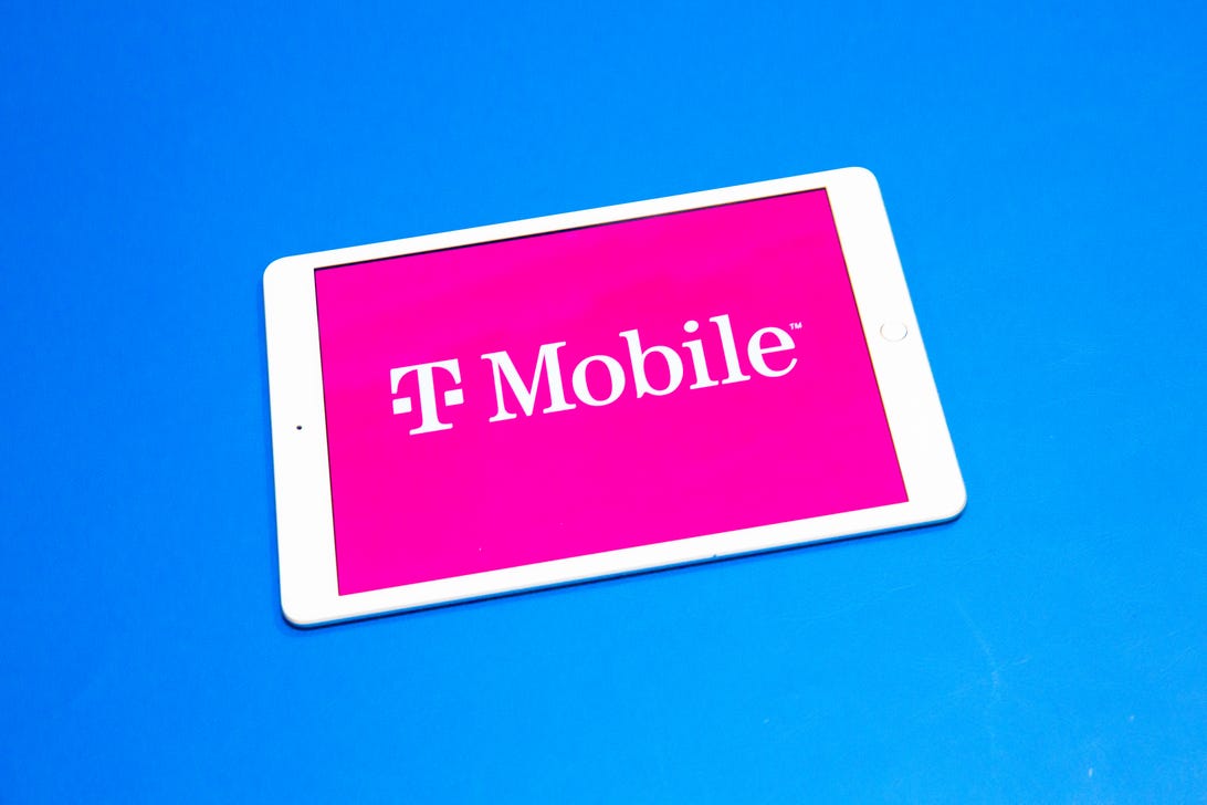 pink T-Mobile logo on the screen of a white iPad