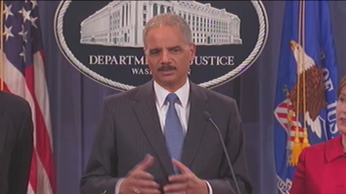 Attorney General Eric Holder says his department's lawsuit is "essential to preserving a competitive marketplace" in e-books.