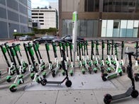 <p>Freshly charged Lime and Bird scooters.</p>