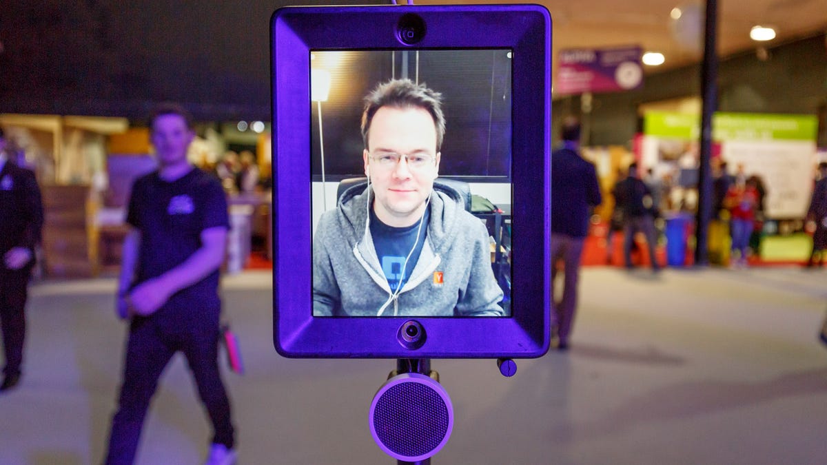 Double Robotics CEO David Cann appear on the screen of Double telepresence robot at Web Summit 2015.​