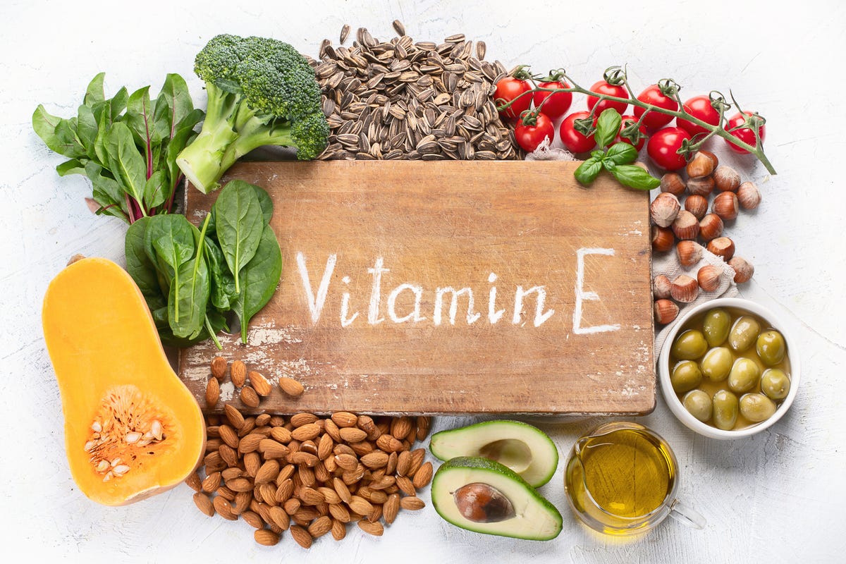 Examples of foods rich in vitamin E like avocado, nuts, berries, broccoli, spinach and squash