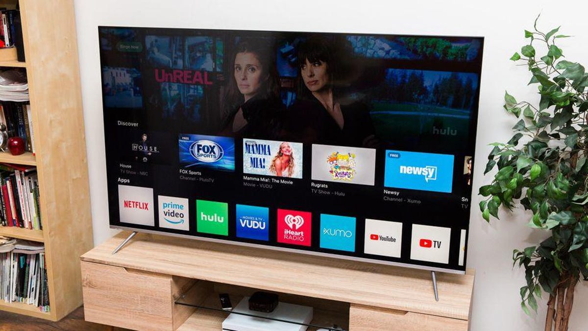 A Vizio P-Series TV with various app icons on its screen