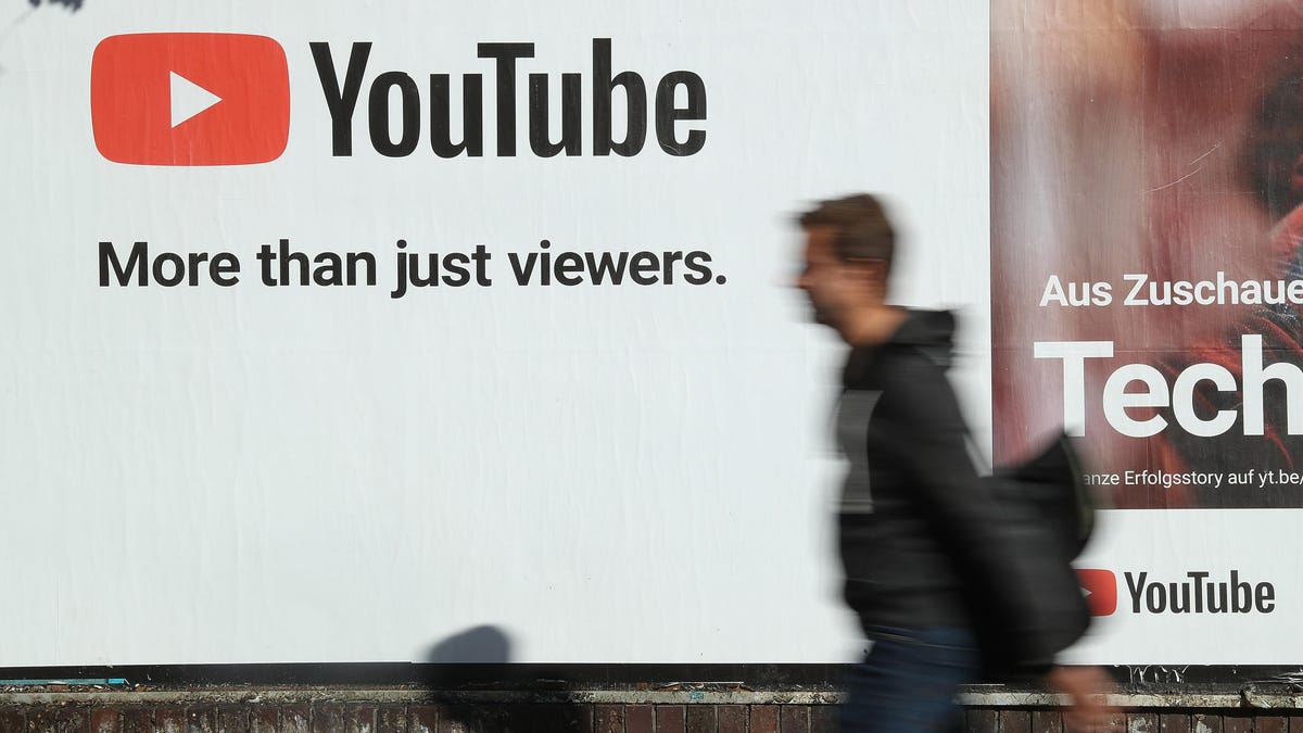 A YouTube billboard bears the tagline "More than just viewers."