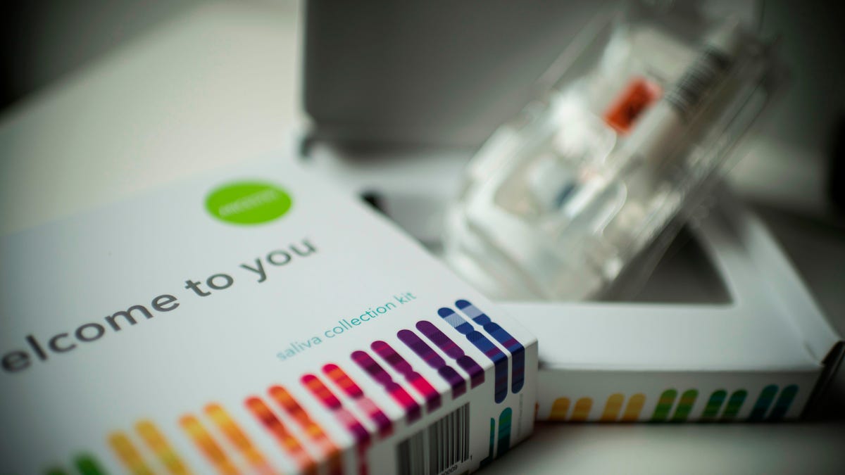 A DNA test kit, partially unwrapped.