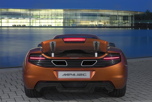 The 12C flashes its Airbrake for the camera.
