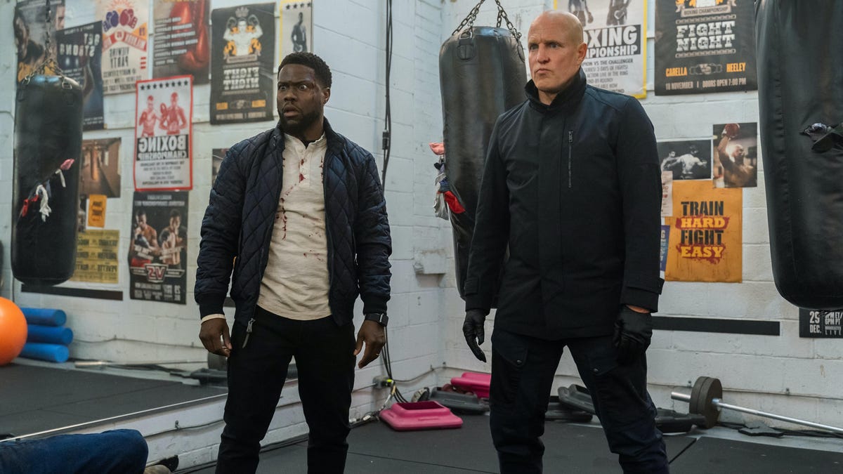 Kevin Hart and Woody Harrelson in a boxing gym.