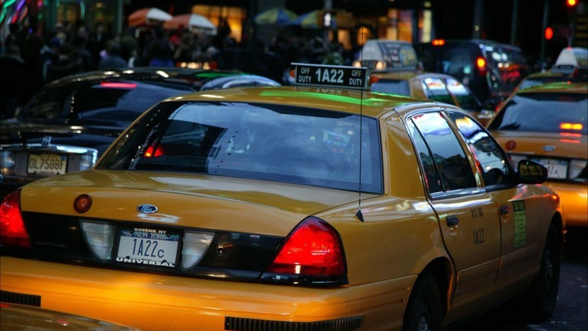 New York's taxi commission vetoes Uber's cab-hailing app.