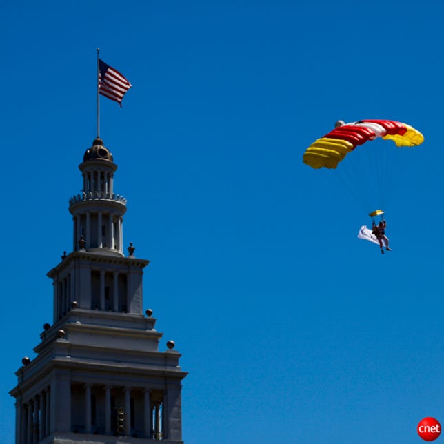 T-Mobile parachuter descends into Justin Herman Plaza.