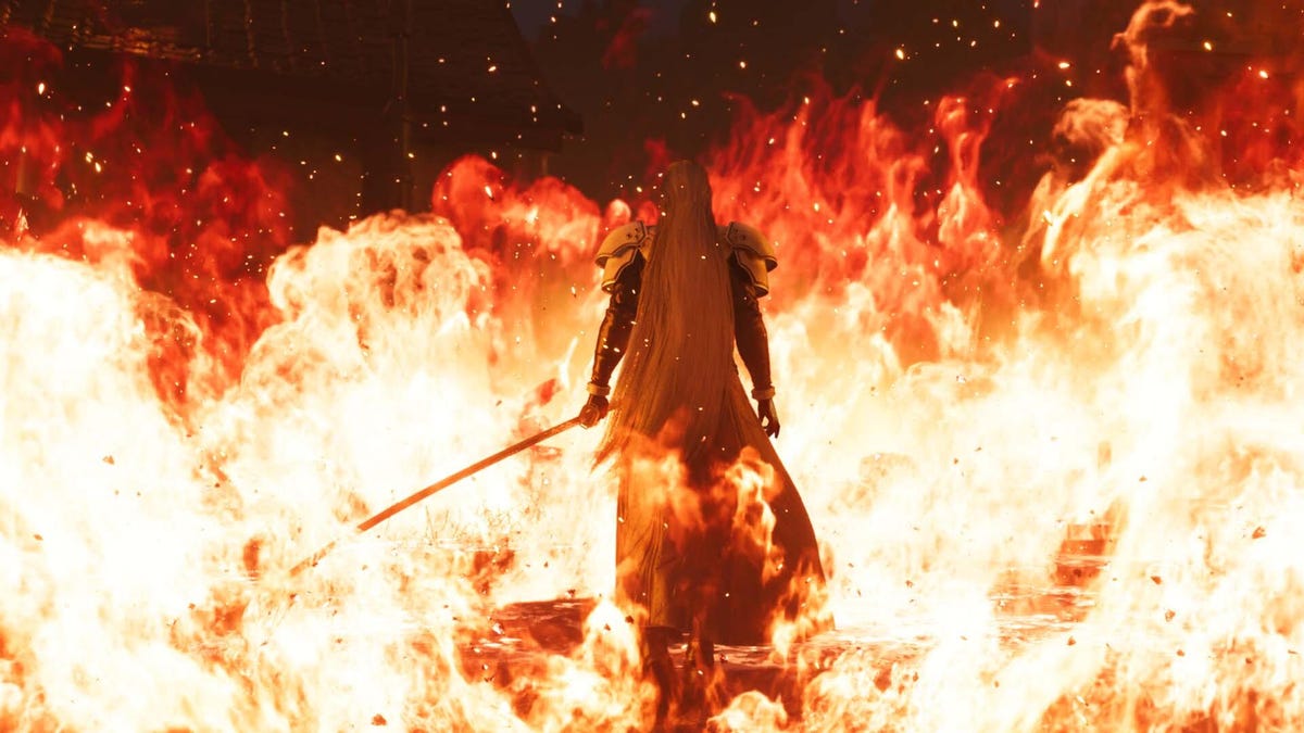 A man with silver hair and a ridiculously long sword walks into a wall of fire.