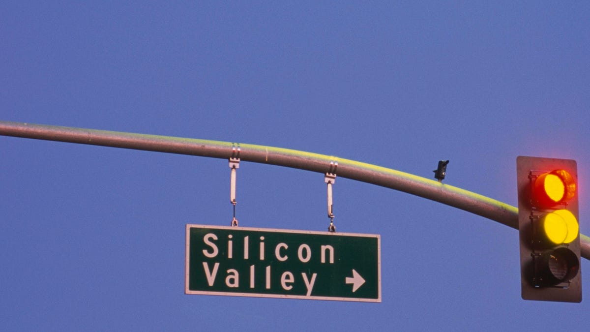 Low angle view of traffic lights and a street sign, Silicon Valley, San Francisco, California, USA