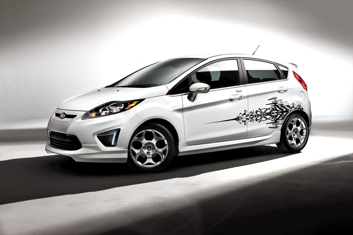 With its 2011 Ford Fiesta, the automaker is adding custom graphics to its accessory options, letting owners select from about 18 designs in several colors, including a cityscape, bubbles, flames, and even ninja blades.