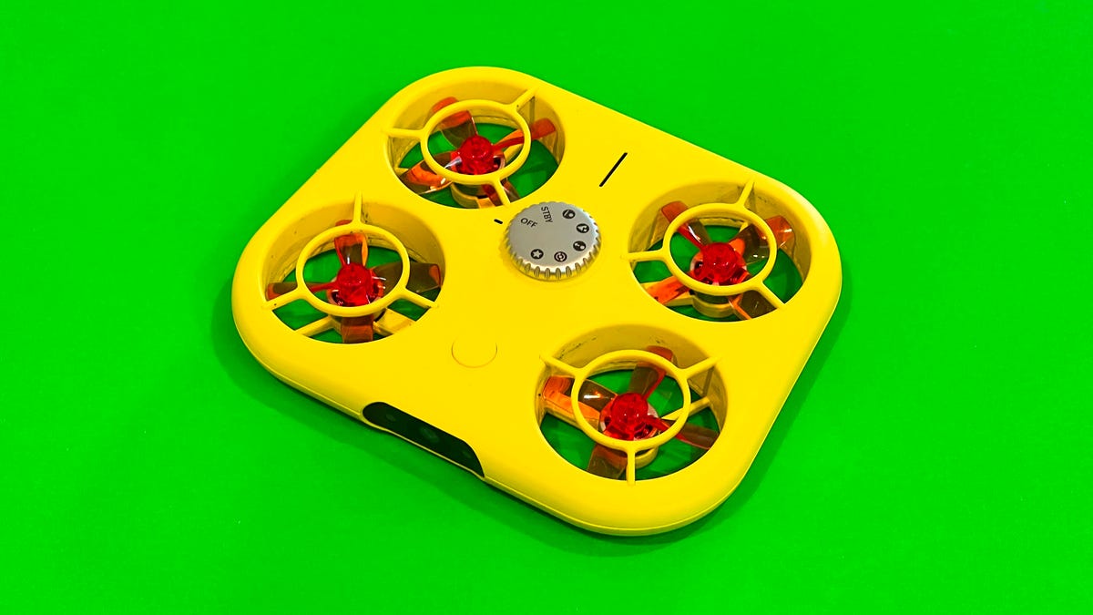 The Snap Pixy, a yellow flying camera drone.