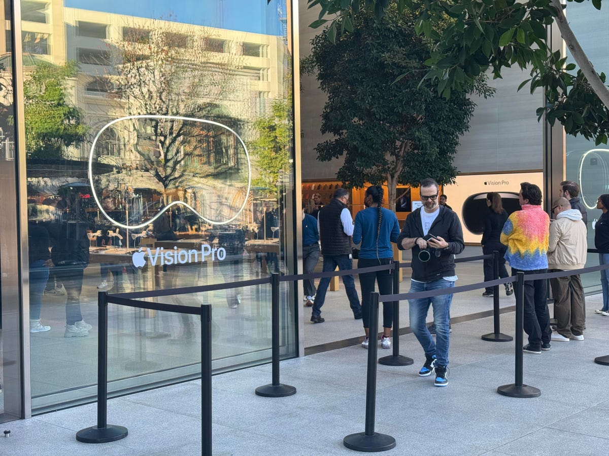 People waiting in line for the Apple Vision Pro