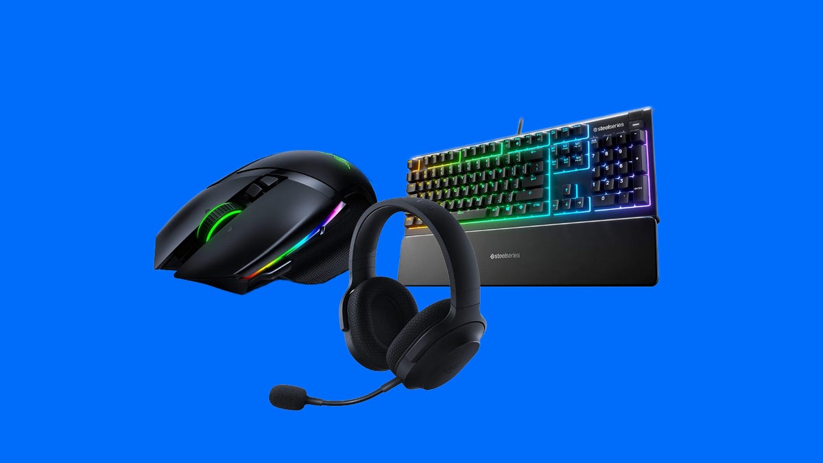 Mouse, headset and keyboard on a blue background