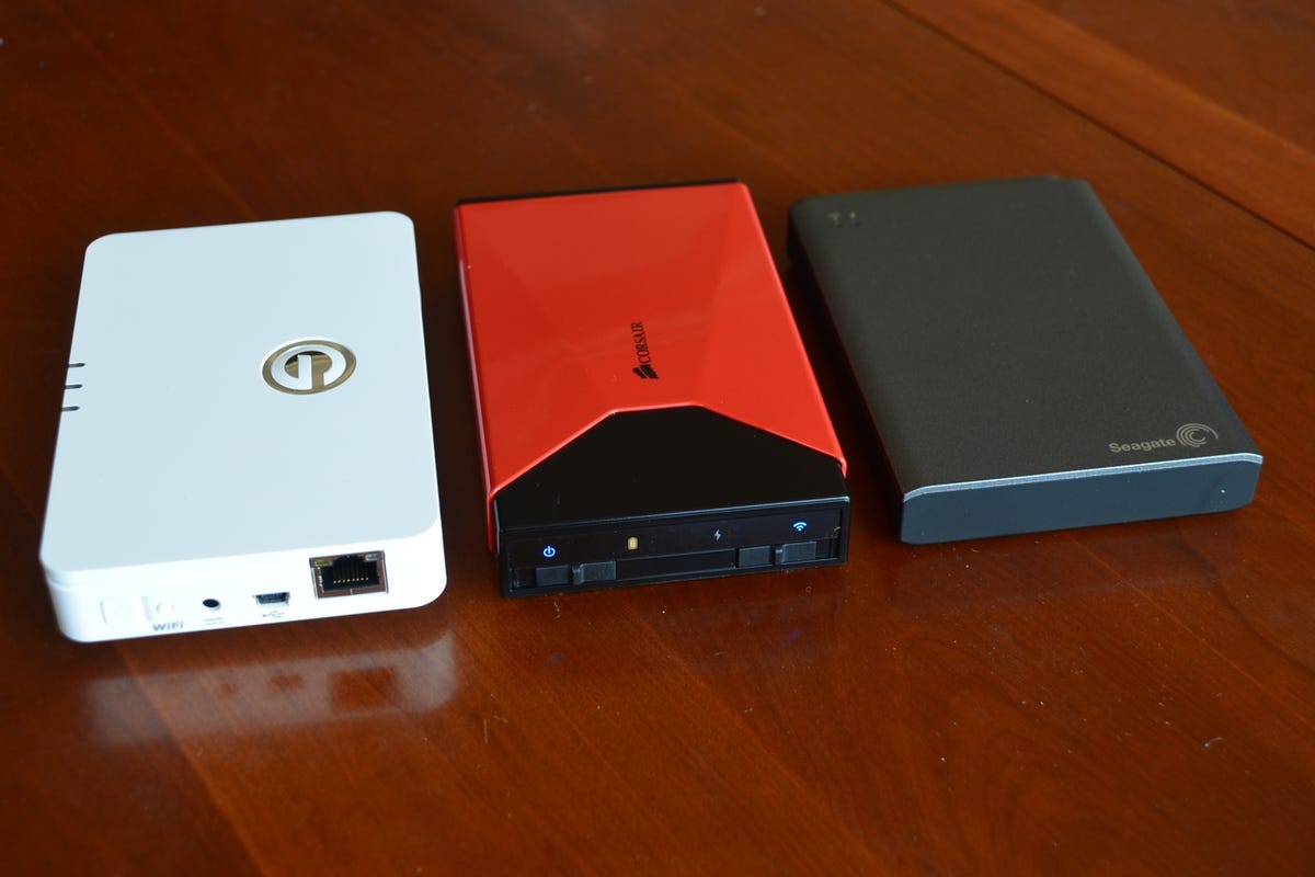 The Voyager (middle) is about the same size as other hard-drive-based mobile storage solutions on the market, including the G-Connect (left) and the Wireless Plus.