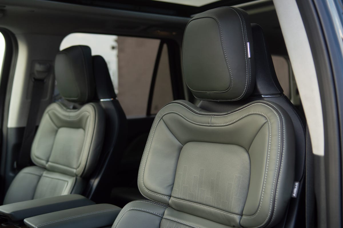 2022 Lincoln Navigator detail shot of front seats with green leather