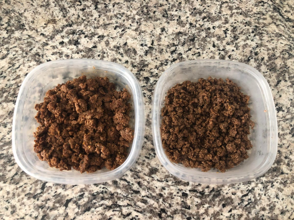 Two containers of cooked taco filling on a counter
