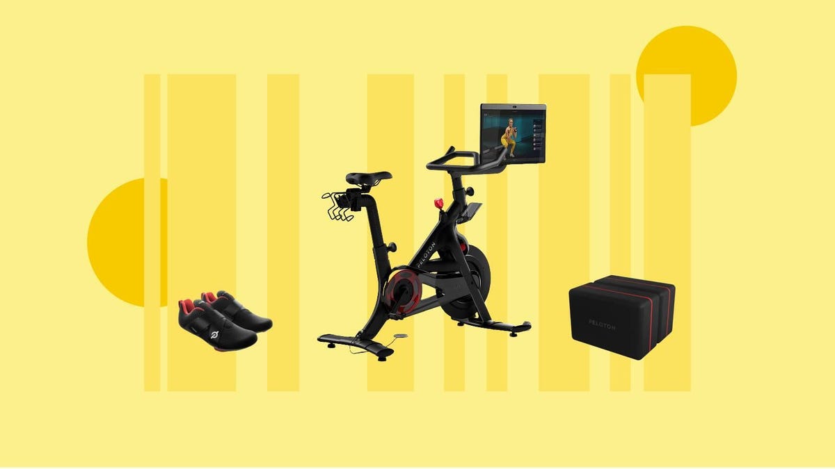 Peloton cycling shoes, Bike Plus and yoga blocks are displayed against a yellow background.