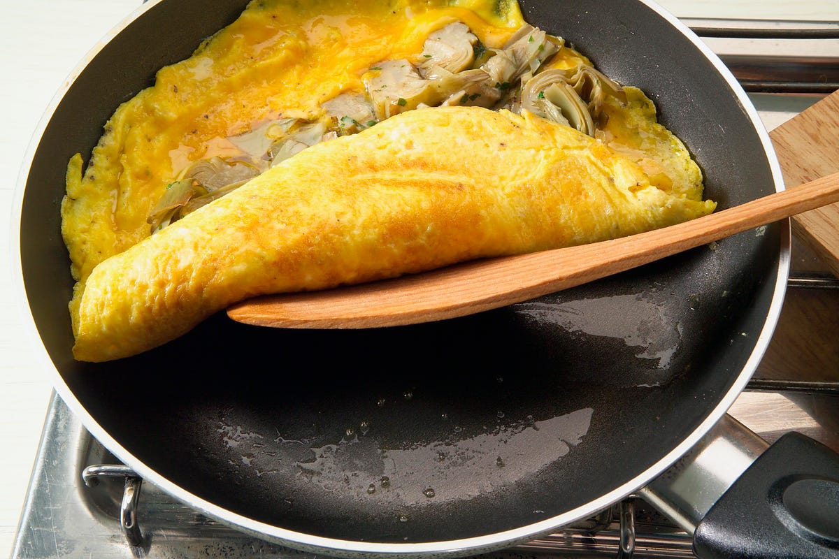 Omelette folded over the artichoke