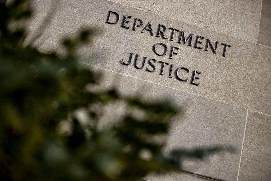 Sign at the US Department of Justice headquarters in Washington, DC